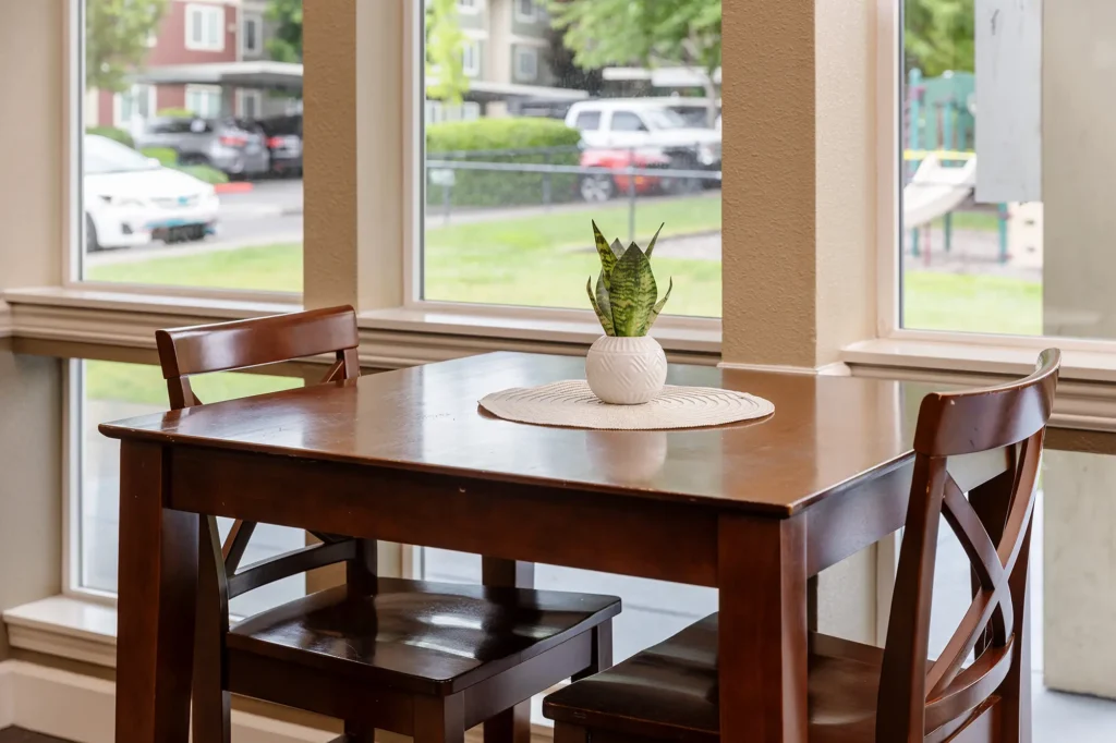 Dining table with two chairs.